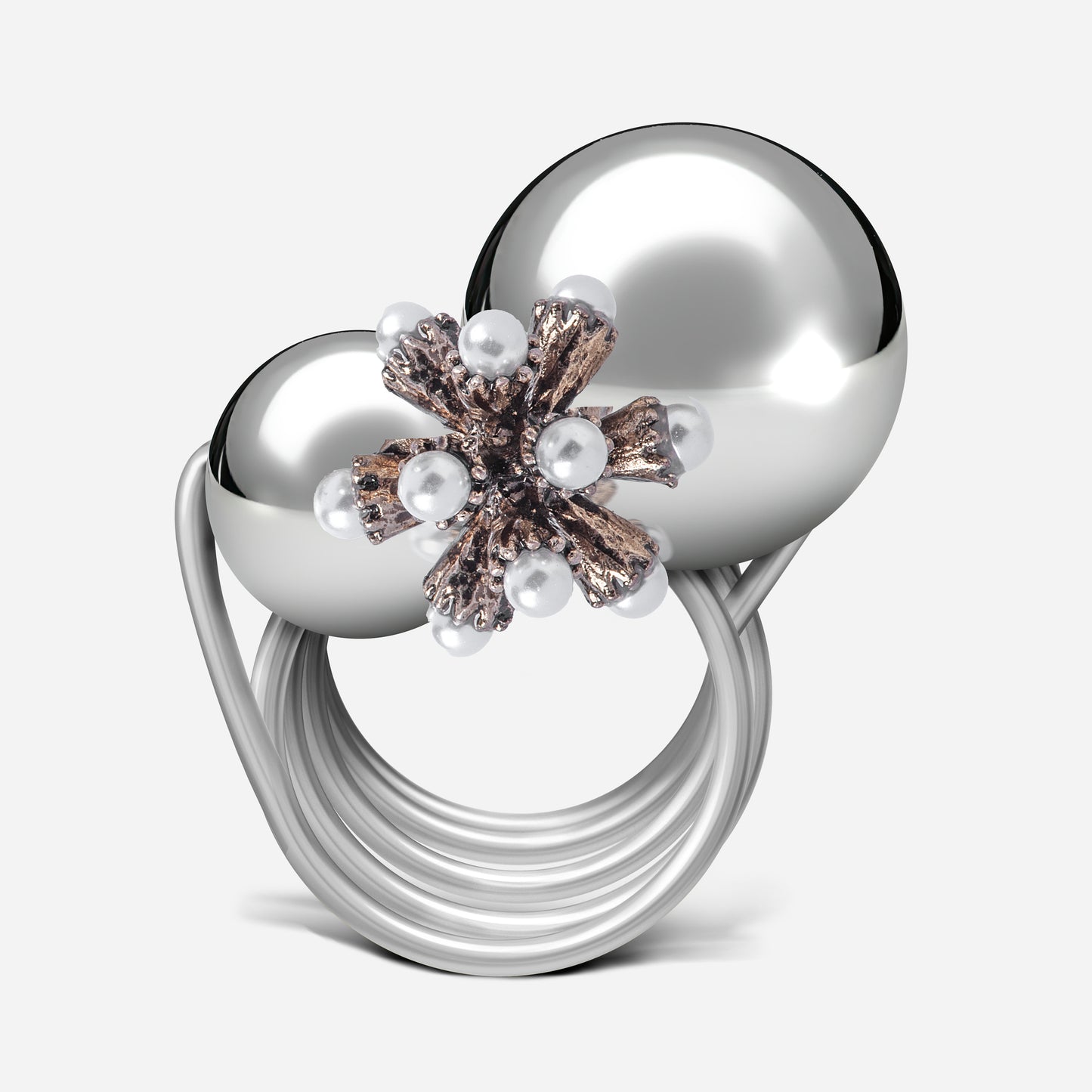 Mit seiner festlichen Eleganz und kunstvollen Gestaltung zieht dieser Ring aus der Weihnachtskollektion alle Blicke auf sich. Zwei versilberte Kugeln in verschiedenen Größen bilden die Basis, während ein florales Element mit filigranen Perlen dem Design eine winterliche und verspielte Note verleiht. Die Kombination aus glänzenden Oberflächen und detaillierten Akzenten macht diesen Ring zu einem idealen Accessoire für die Feiertage und verleiht jedem Outfit einen stilvollen, festlichen Touch.